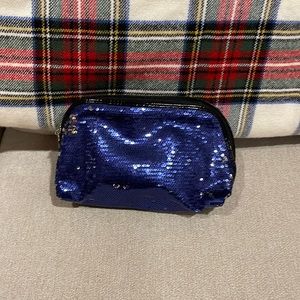 Nine West blue/silver sequins cosmetic pouch with animal print interior